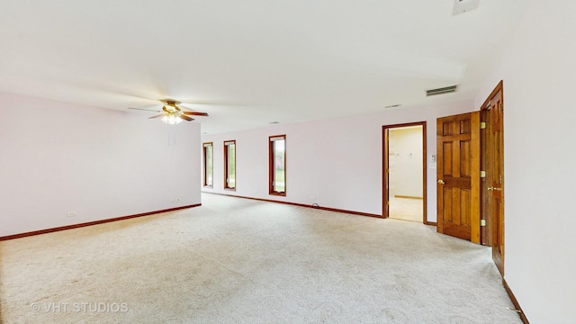 17N560 Hidden Hills Trl, Dundee, IL 60118 - unfurnished living room with baseboards, a fireplace with raised hearth, and carpet floors