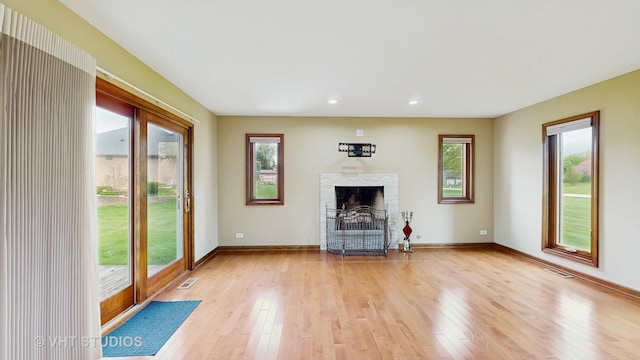 17N560 Hidden Hills Trl, Dundee, IL 60118 - unfurnished living room with baseboards, light wood-style flooring, and recessed lighting