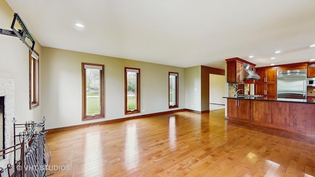 17N560 Hidden Hills Trl, Dundee, IL 60118 - doorway to outside with a sink, visible vents, a ceiling fan, baseboards, and light wood-style floors