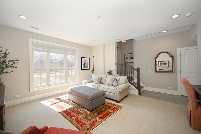 living room with recessed lighting, stairway, visible vents, and baseboards