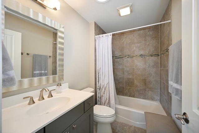 full bathroom with shower / tub combo, toilet, and vanity