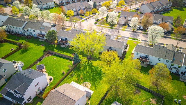 birds eye view of property with a residential view