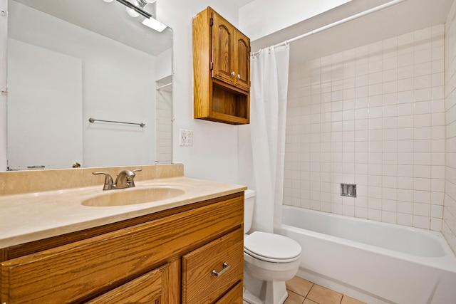 2275 Country Club Dr Unit 24, Woodridge, IL 60517 - full bathroom featuring vanity, toilet, tile patterned flooring, and shower / bath combo with shower curtain