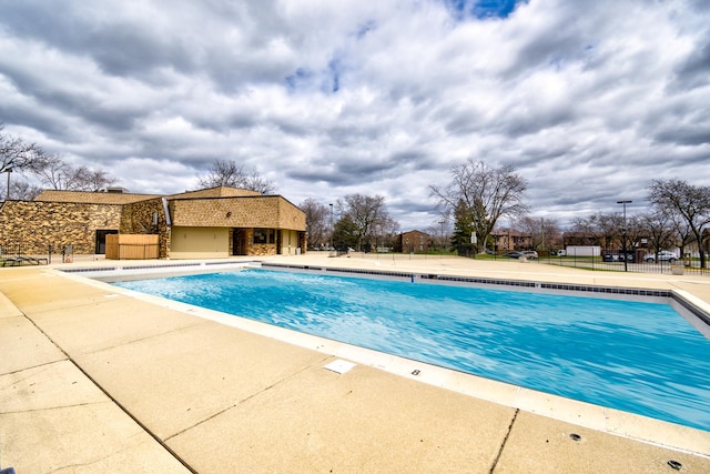 2275 Country Club Dr Unit 24, Woodridge, IL 60517 - community pool featuring a patio