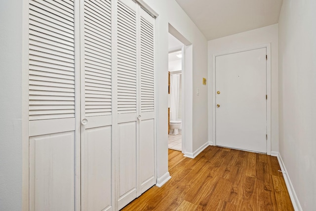 2275 Country Club Dr Unit 24, Woodridge, IL 60517 - corridor featuring wood finished floors and baseboards