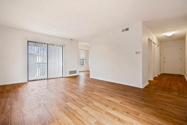 2275 Country Club Dr Unit 24, Woodridge, IL 60517 - spare room featuring wood finished floors and baseboards