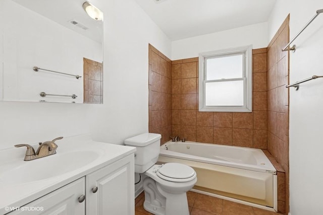 full bathroom with vanity, visible vents, shower / washtub combination, tile patterned floors, and toilet