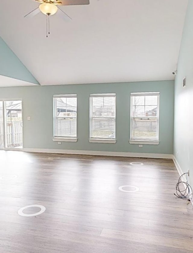 6156 Stone Pathway, Bourbonnais, IL 60914 - kitchen with white cabinets, a notable chandelier, appliances with stainless steel finishes, vaulted ceiling, and dark wood-style floors