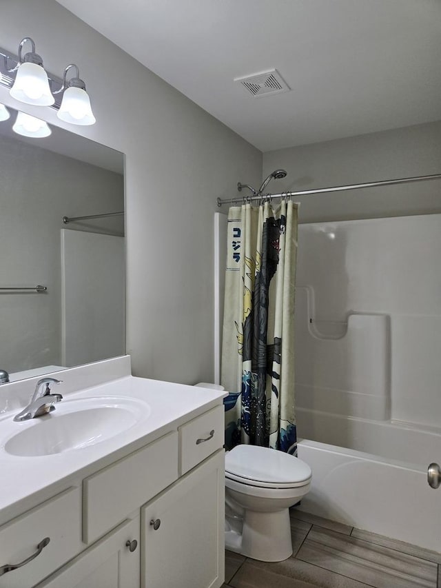 6156 Stone Pathway, Bourbonnais, IL 60914 - bathroom with visible vents, shower / bath combination with curtain, toilet, and vanity