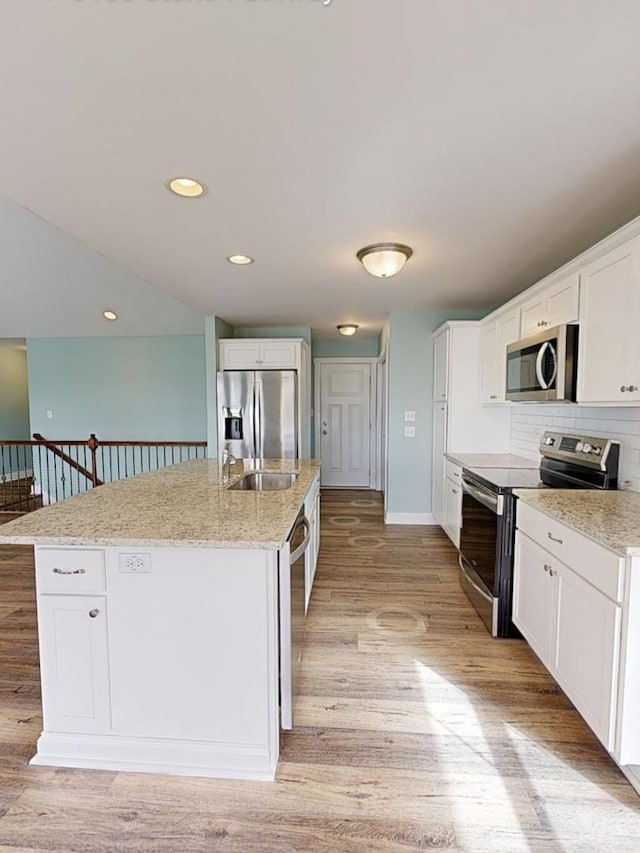 6156 Stone Pathway, Bourbonnais, IL 60914 - kitchen featuring tasteful backsplash, a sink, dark wood-style floors, stainless steel appliances, and white cabinetry