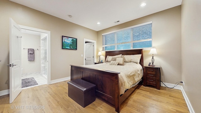 bedroom featuring visible vents, baseboards, recessed lighting, connected bathroom, and light wood-style flooring
