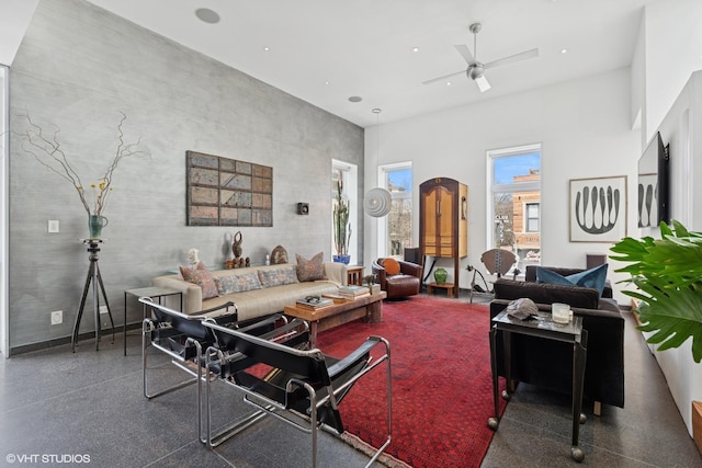 1825 W Wabansia Ave, Chicago, IL 60622 - living area with a ceiling fan, a high ceiling, and baseboards