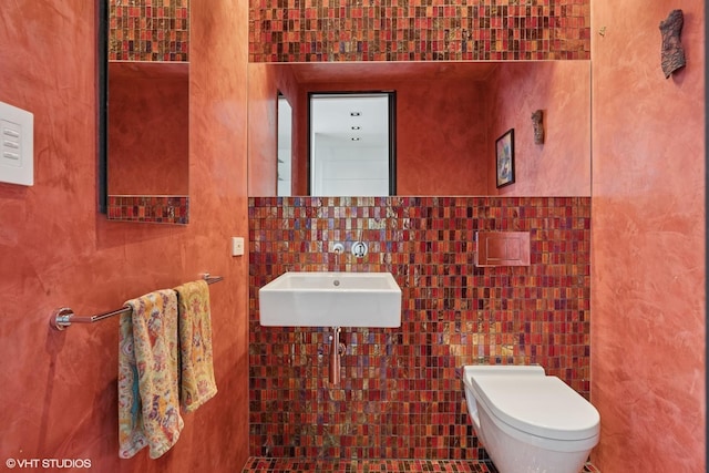 1825 W Wabansia Ave, Chicago, IL 60622 - bathroom with tile walls, a sink, and toilet