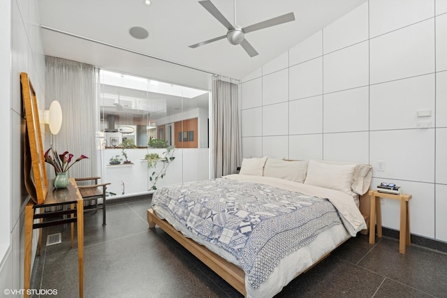 1825 W Wabansia Ave, Chicago, IL 60622 - bedroom featuring vaulted ceiling, a ceiling fan, and light aggregate flooring