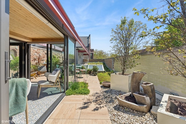 1825 W Wabansia Ave, Chicago, IL 60622 - fenced backyard with a wooden deck