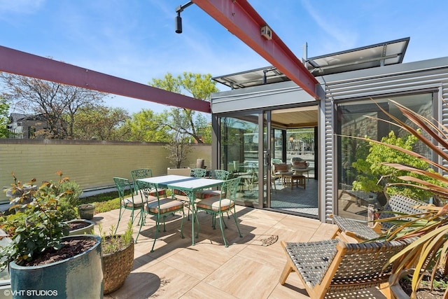 1825 W Wabansia Ave, Chicago, IL 60622 - wooden deck with a sunroom and outdoor dining space