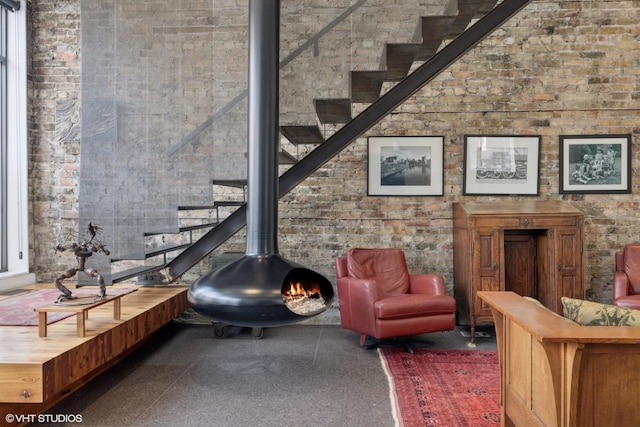 1825 W Wabansia Ave, Chicago, IL 60622 - living room with stairway and a wood stove