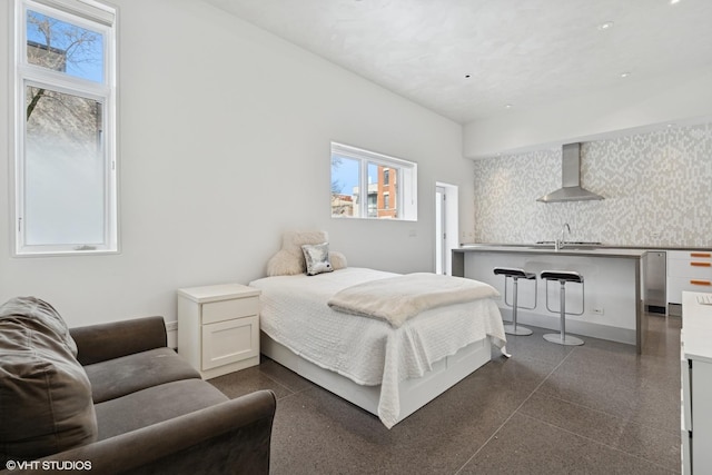 1825 W Wabansia Ave, Chicago, IL 60622 - bedroom featuring granite floors, multiple windows, and a sink