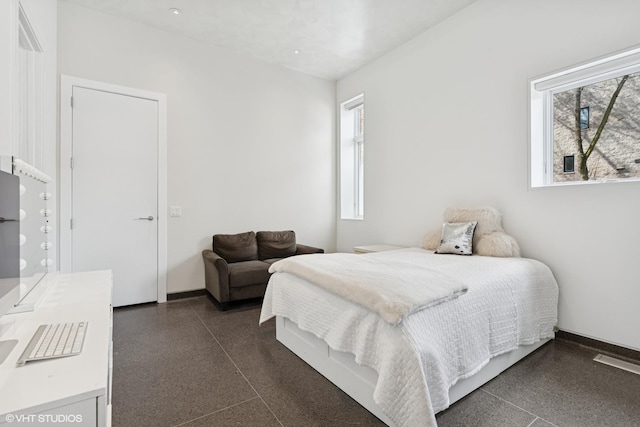 1825 W Wabansia Ave, Chicago, IL 60622 - bedroom with light speckled floor and baseboards