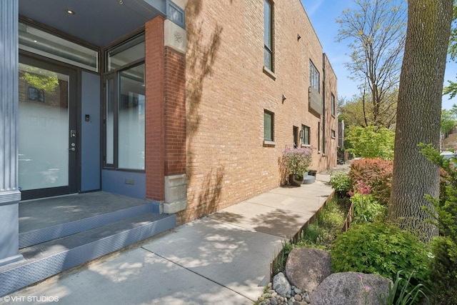 1825 W Wabansia Ave, Chicago, IL 60622 - view of exterior entry featuring brick siding