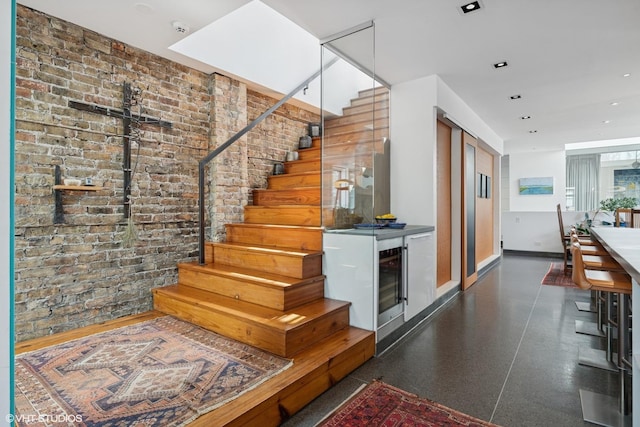 1825 W Wabansia Ave, Chicago, IL 60622 - stairway with baseboards and brick wall