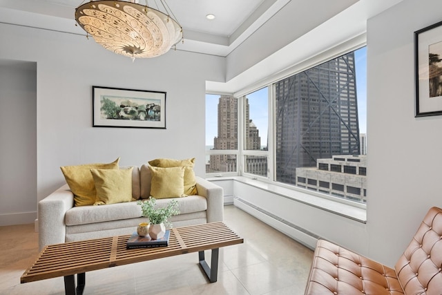 living area featuring a view of city, light tile patterned floors, and baseboards