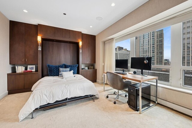 bedroom featuring light colored carpet, baseboards, and recessed lighting