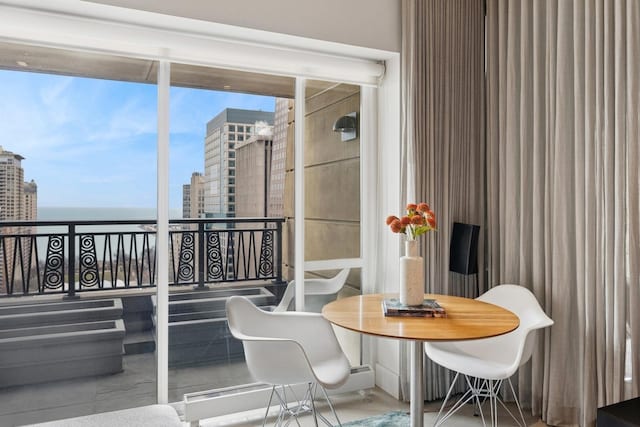 interior space featuring a water view and a city view