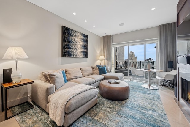 living area with recessed lighting and a view of city