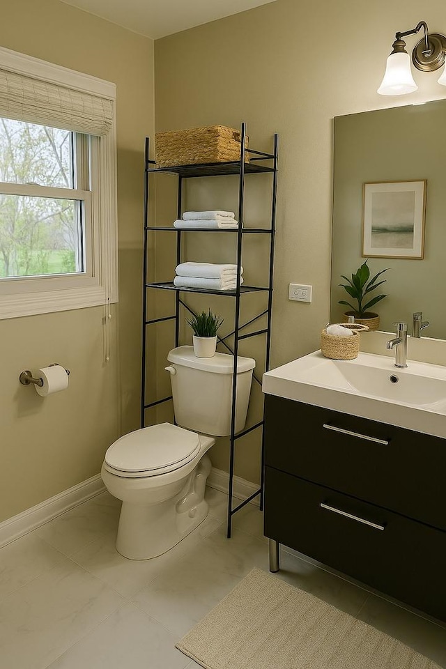 986 Rossmere Ct, Naperville, IL 60540 - bathroom with toilet, baseboards, and vanity