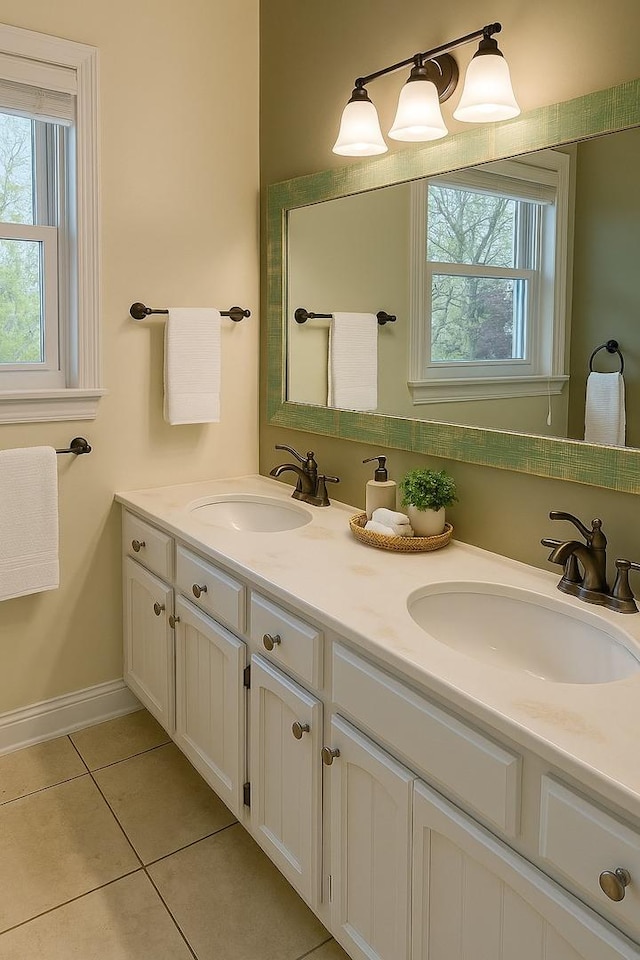 986 Rossmere Ct, Naperville, IL 60540 - bathroom featuring tile patterned floors, plenty of natural light, double vanity, and baseboards