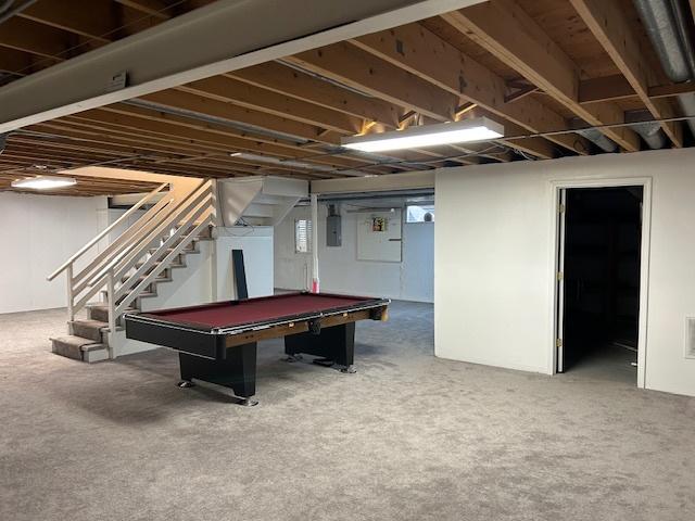 rec room with carpet, pool table, electric panel, and visible vents