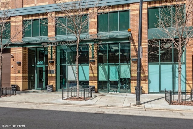 400 W Ontario St Unit 606, Chicago, IL 60654 - entrance to property with brick siding