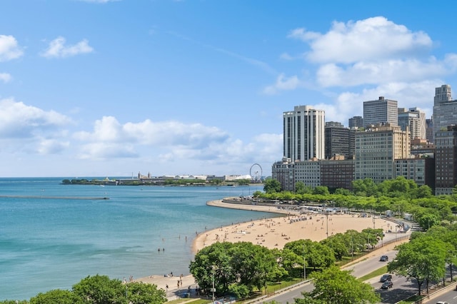 water view featuring a city view and a view of the beach