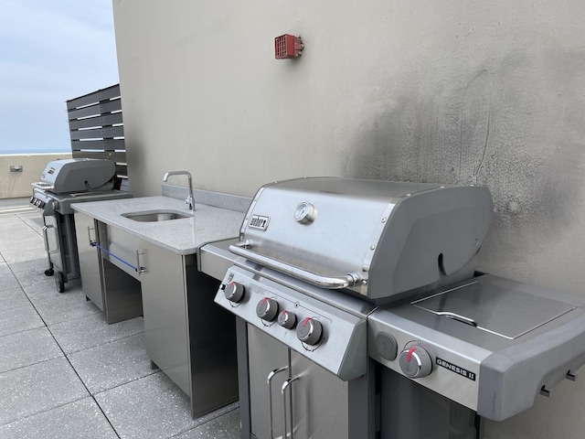 view of patio / terrace featuring a sink and grilling area