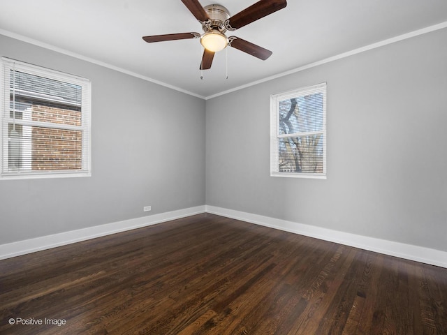 unfurnished room with dark wood finished floors, ceiling fan, baseboards, and ornamental molding