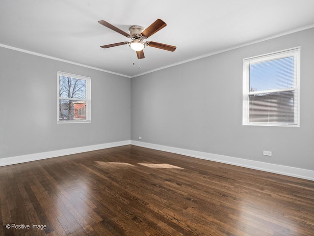 empty room featuring ceiling fan, crown molding, baseboards, and dark wood-style flooring