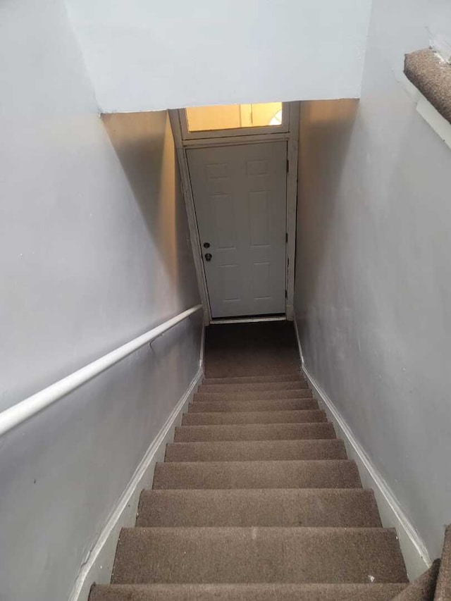 6506 S Eberhart Ave, Chicago, IL 60637 - staircase with baseboards and carpet floors