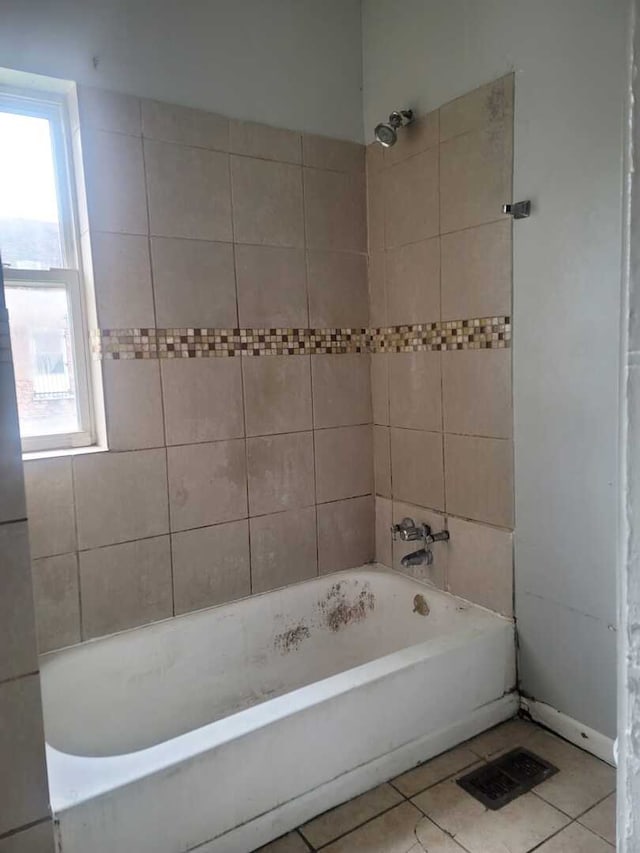 6506 S Eberhart Ave, Chicago, IL 60637 - bathroom featuring visible vents, bathing tub / shower combination, a wealth of natural light, and tile patterned flooring