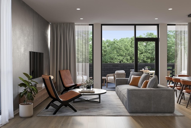5114 S Kenwood Ave Unit 3B, Chicago, IL 60615 - living area featuring a wall of windows, wood finished floors, and recessed lighting