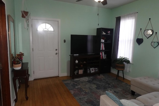 3801 W 46th St, Chicago, IL 60632 - living room featuring baseboards, ceiling fan, and wood-type flooring