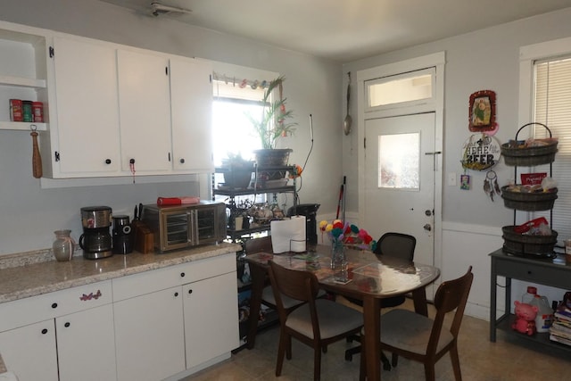 3801 W 46th St, Chicago, IL 60632 - kitchen featuring a toaster and white cabinets