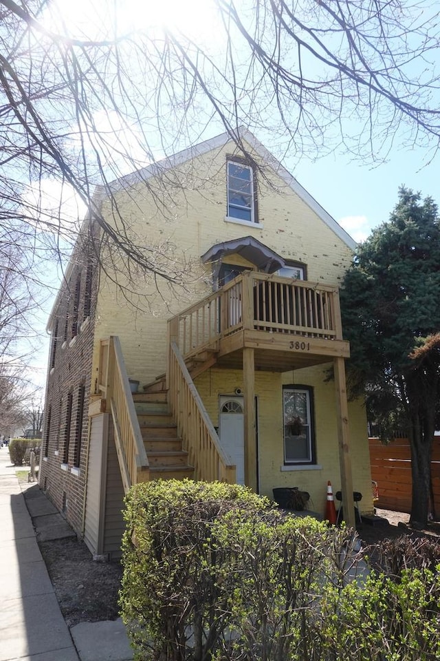 3801 W 46th St, Chicago, IL 60632 - exterior space featuring stairway and brick siding