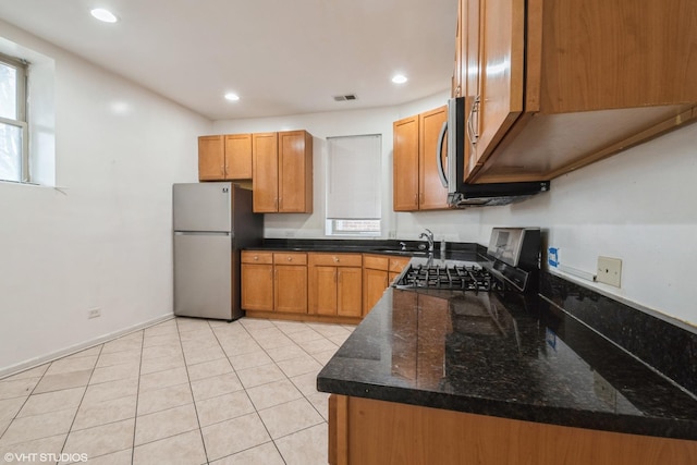 1516 E Marquette Rd Unit 2E, Chicago, IL 60637 - kitchen with recessed lighting, visible vents, a sink, dark stone countertops, and stainless steel appliances