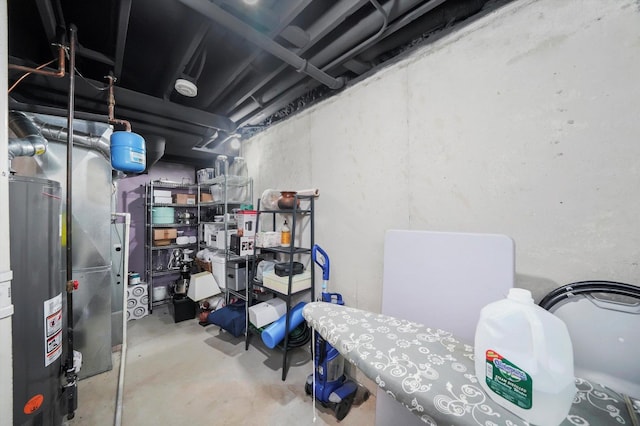 unfinished below grade area featuring gas water heater