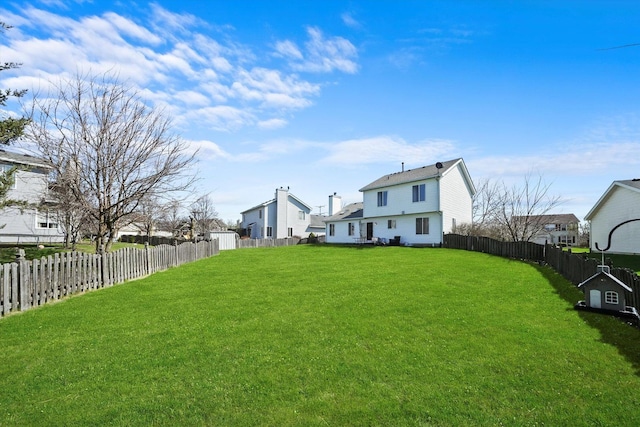 view of yard featuring a fenced backyard