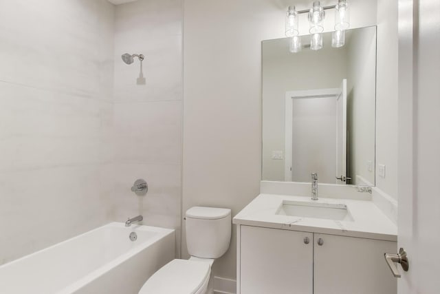 full bathroom featuring toilet, bathtub / shower combination, and vanity