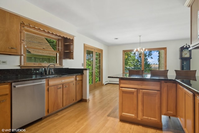 kitchen featuring dishwasher, a notable chandelier, brown cabinetry, and baseboard heating