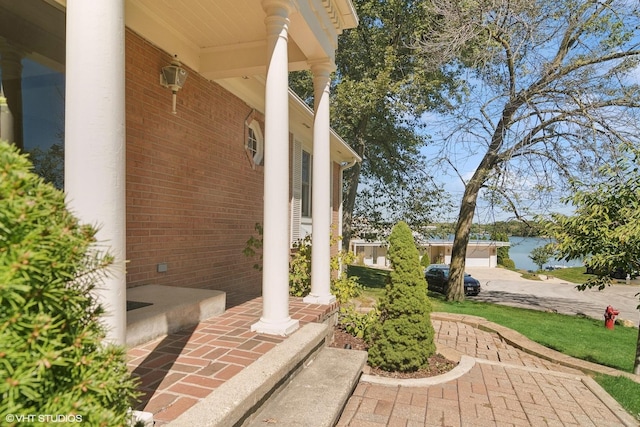 view of patio featuring a water view