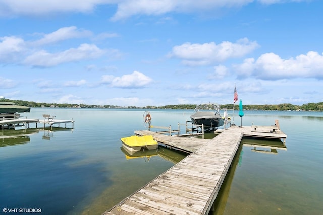 dock area featuring a water view and boat lift